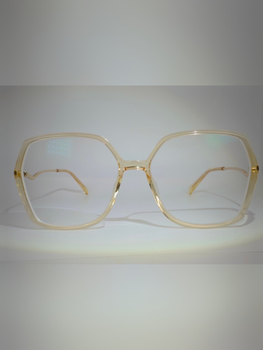 Ellipse. Clear Champagne Oversized Square Sunglasses - Women's